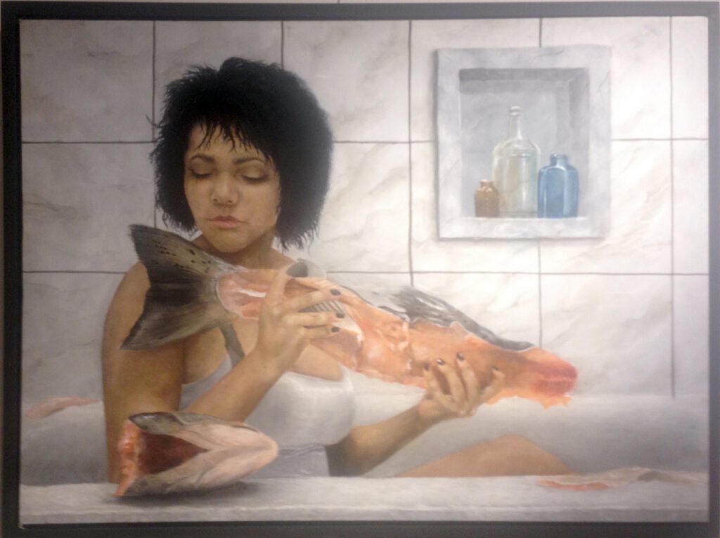 an image of woman with fish